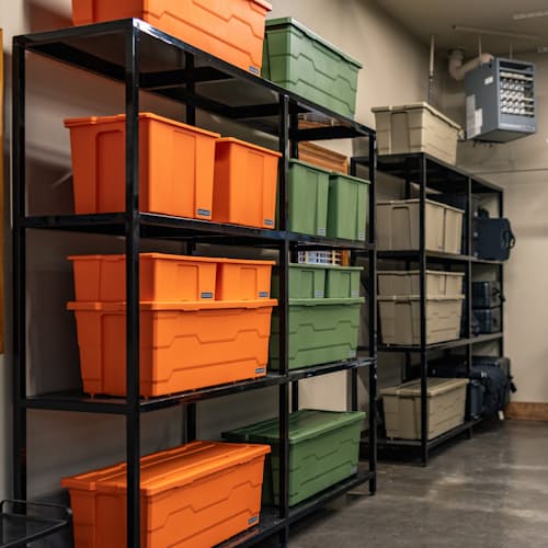 lifestyle image of Payloader Storage Bin - Single Pack - 64 L