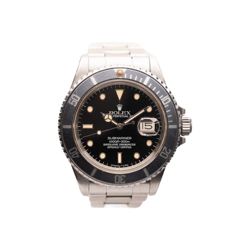 laydown image of 1984 Rolex 16800 Submariner