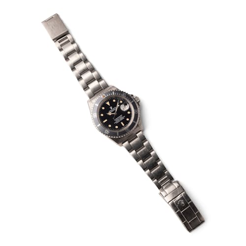 laydown image of 1984 Rolex 16800 Submariner