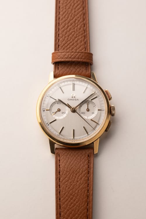 laydown detail image of Omega Gold Chronograph 101.009