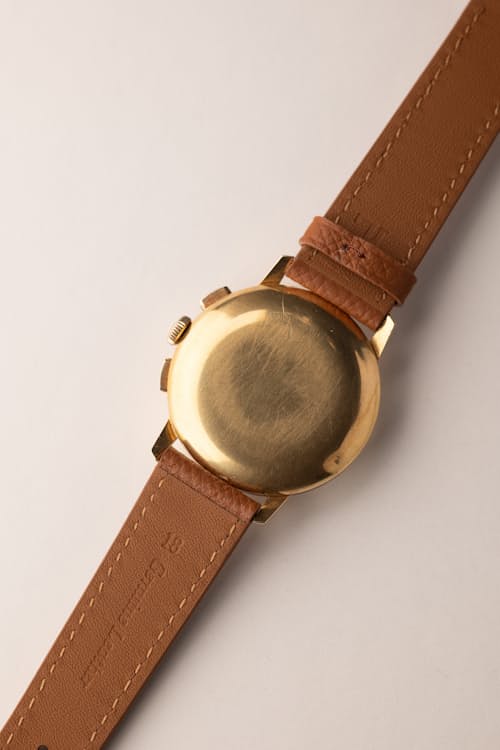 laydown detail image of Omega Gold Chronograph 101.009