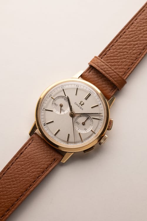 laydown detail image of Omega Gold Chronograph 101.009
