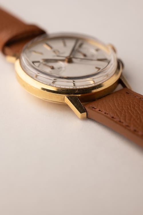 laydown detail image of Omega Gold Chronograph 101.009