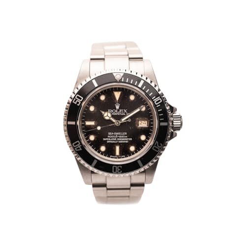 laydown image of 1984 Rolex 16660 Tropical Sea-Dweller