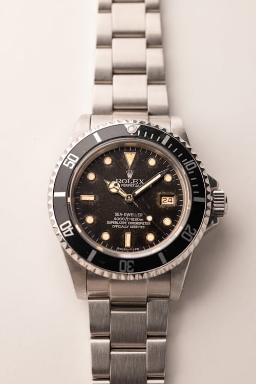 laydown detail image of 1984 Rolex 16660 Tropical Sea-Dweller