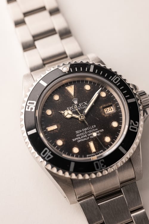 laydown detail image of 1984 Rolex 16660 Tropical Sea-Dweller