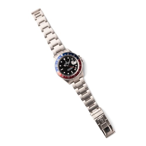 laydown image of 2006 Rolex 16710 GMT Master II