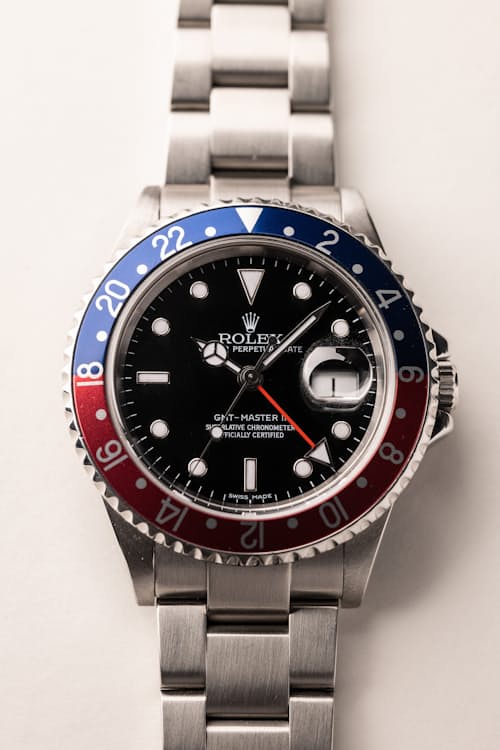 laydown detail image of 2006 Rolex 16710 GMT Master II