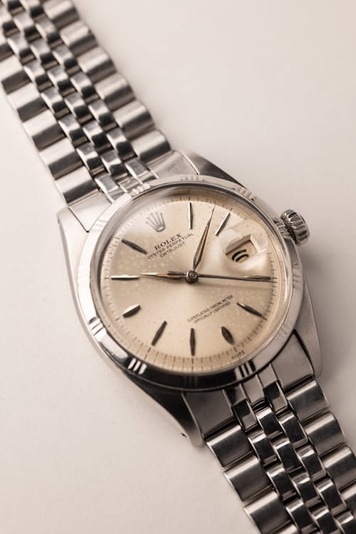 laydown detail image of 1960 Rolex 1603 Silver "Bamboo Bezel" Datejust