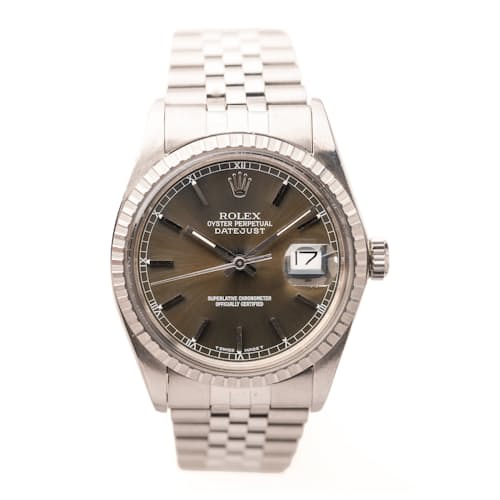 laydown image of 1986 Rolex 16030 Tropical Olive Green Datejust