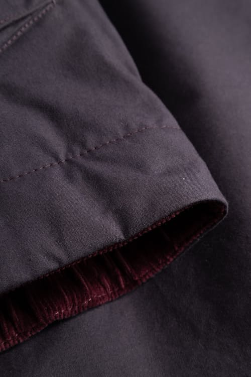 laydown detail image of Holmen Wax Raglan Insulated Jacket