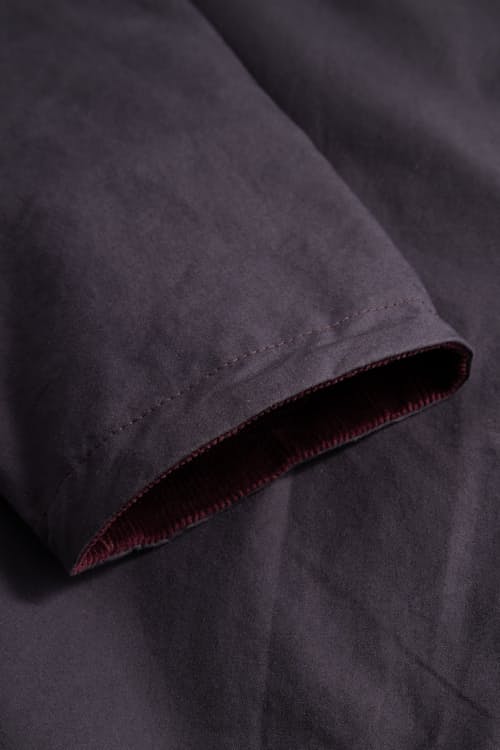laydown detail image of Holmen Wax Raglan Insulated Jacket