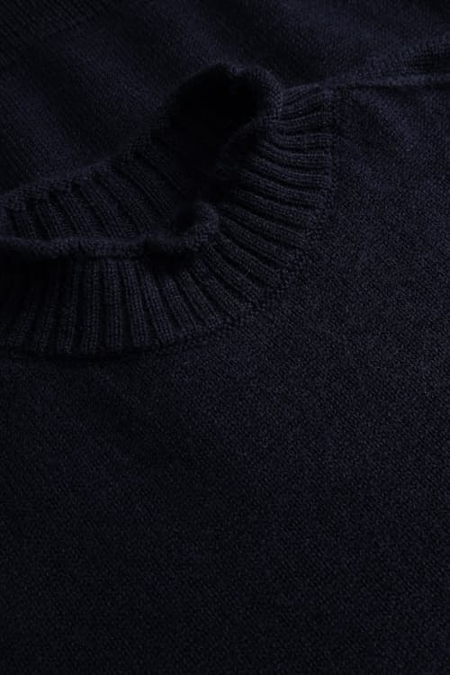 laydown detail image of Sagvatnet Wool Roll Neck Sweater