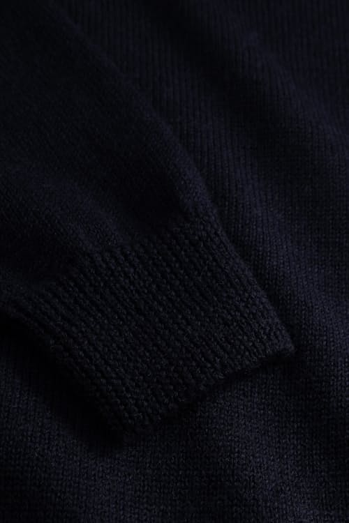 laydown detail image of Sagvatnet Wool Roll Neck Sweater