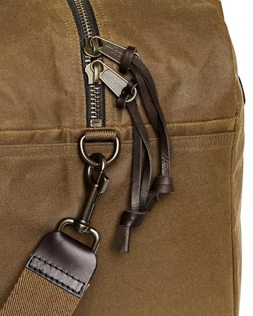 laydown detail image of TIn Cloth Medium Duffle Bag