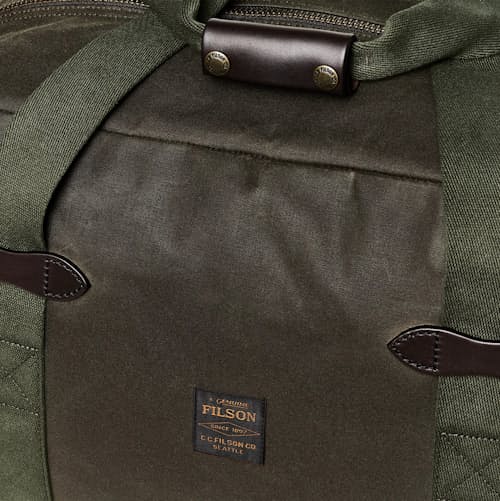 laydown detail image of TIn Cloth Medium Duffle Bag