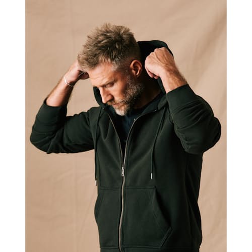 on model image of 10-Year Full Zip Hoodie
