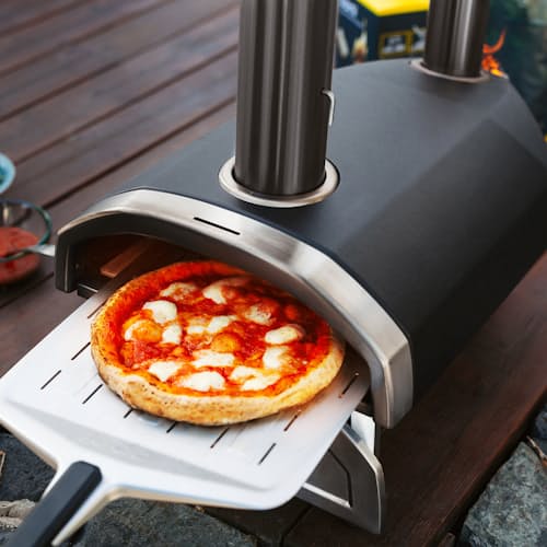 lifestyle image of Ooni Fyra 12 Wood Pellet Pizza Oven