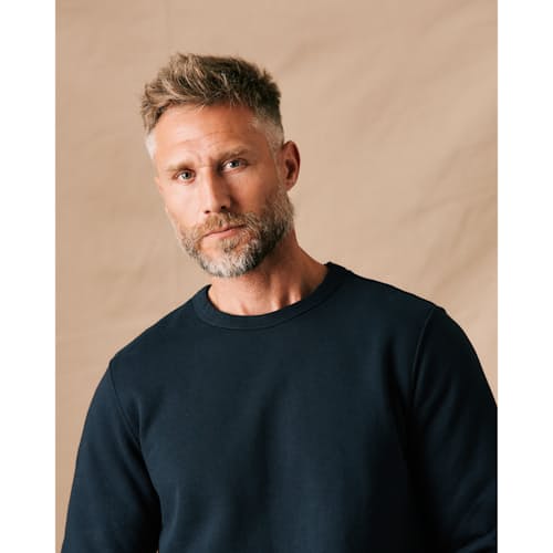 on model image of 10-Year Crewneck Sweatshirt