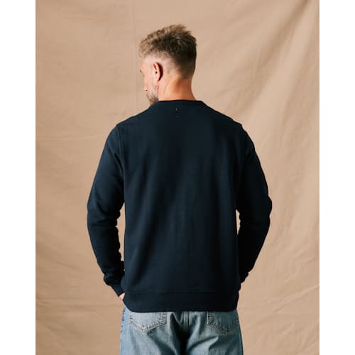 on model image of 10-Year Crewneck Sweatshirt