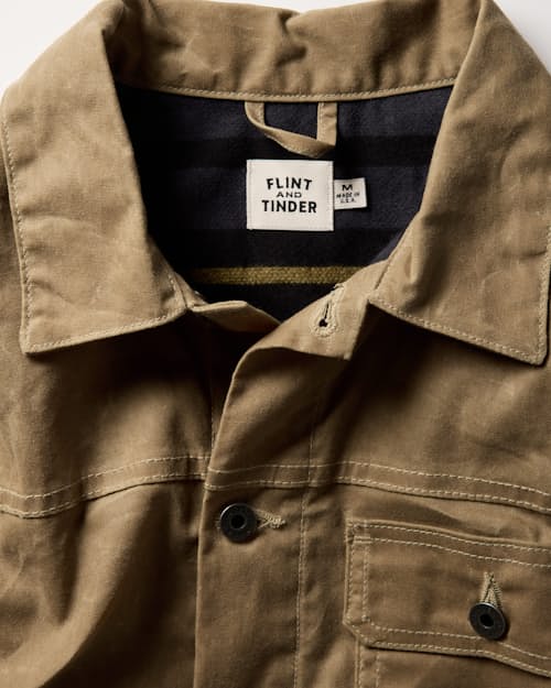 lifestyle image of Flannel-Lined Waxed Trucker Jacket