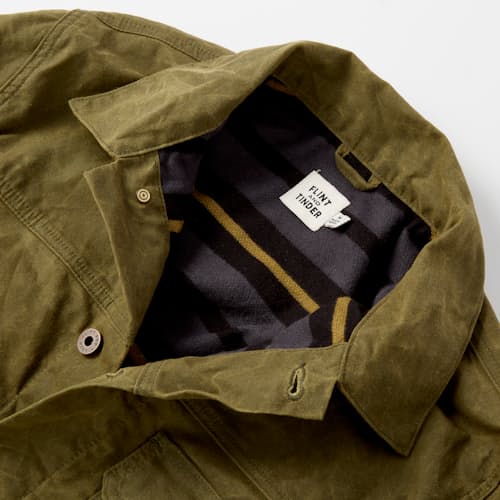 laydown image of Flannel-Lined Waxed Trucker Jacket
