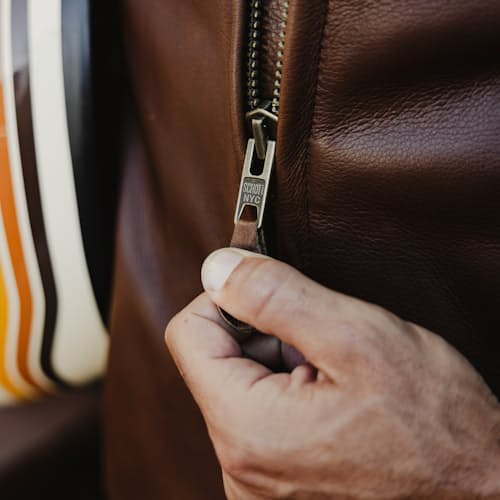 lifestyle image of Waxed Natural Pebbled Cowhide Cafe Leather Jacket