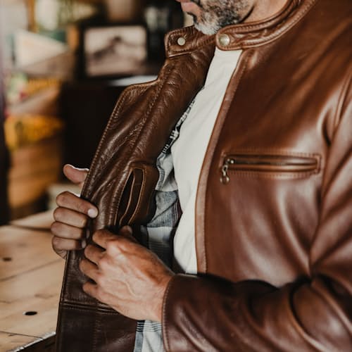 lifestyle image of Waxed Natural Pebbled Cowhide Cafe Leather Jacket