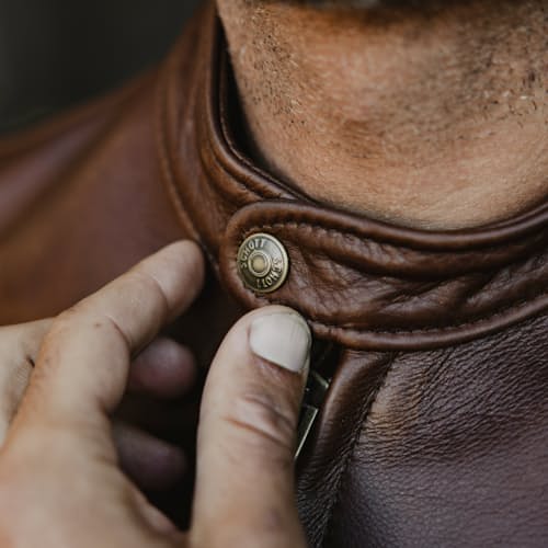 lifestyle image of Waxed Natural Pebbled Cowhide Cafe Leather Jacket