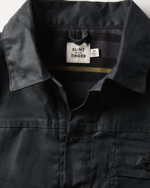 laydown detail image of Flannel-Lined Waxed Trucker Jacket