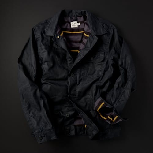 lifestyle image of Flannel-Lined Waxed Trucker Jacket