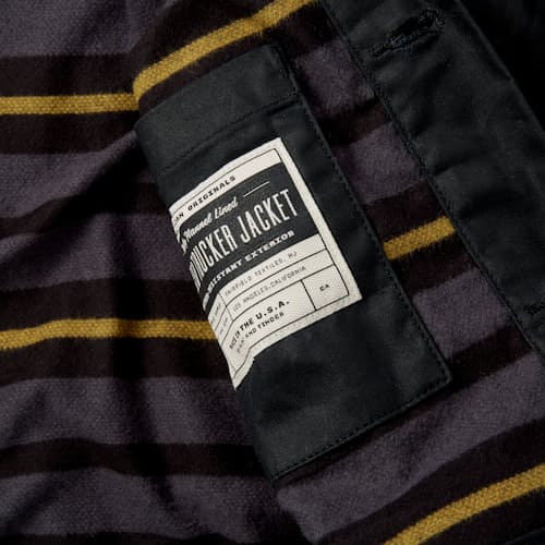 lifestyle image of Flannel-Lined Waxed Trucker Jacket