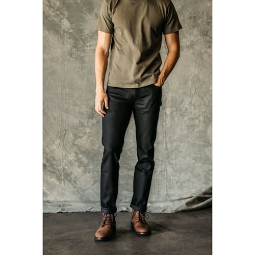 on model image of The Pen Slim Straight Stretch Selvedge Denim Jeans