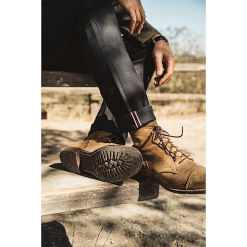 lifestyle image of The Pen Slim Straight Stretch Selvedge Denim Jeans