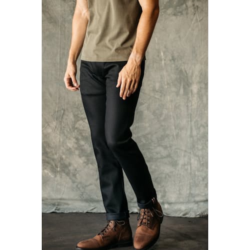 on model image of The Pen Slim Straight Stretch Selvedge Denim Jeans
