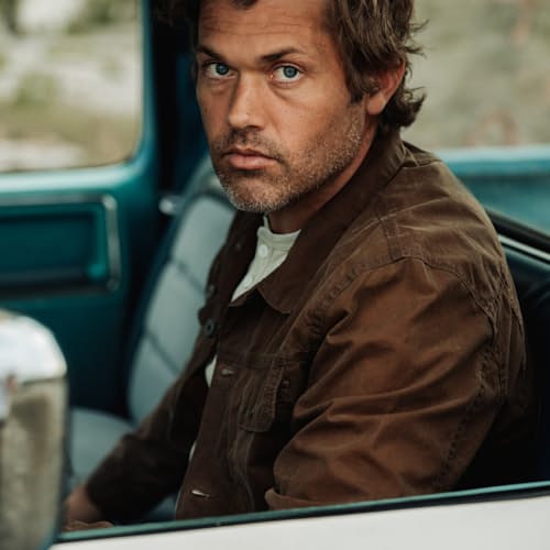 lifestyle image of Unlined Waxed Trucker Jacket