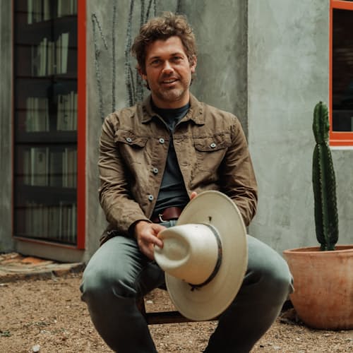 lifestyle image of Unlined Waxed Trucker Jacket