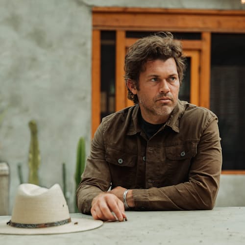 lifestyle image of Unlined Waxed Trucker Jacket