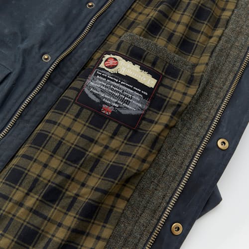 lifestyle image of Flannel-Lined Waxed Hudson Jacket
