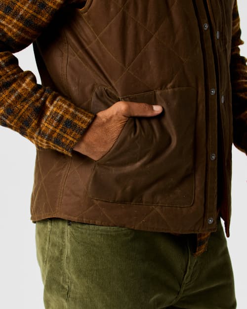 on model image of Quilted Waxed Vest
