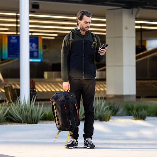 lifestyle image of Layover Travel Pants