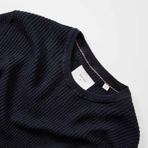 laydown detail image of Waffle Cotton Cashmere Crewneck Sweater