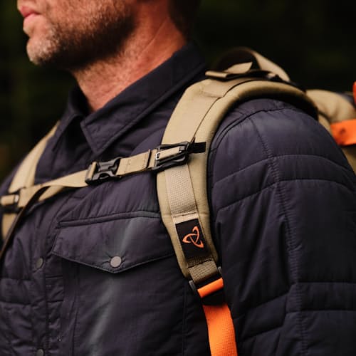 laydown image of Huckberry x Mystery Ranch Urban Assault 21L
