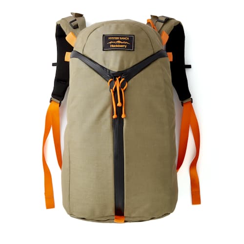 laydown image of Huckberry x Mystery Ranch Urban Assault 21L
