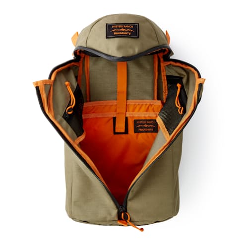 laydown image of Huckberry x Mystery Ranch Urban Assault 21L