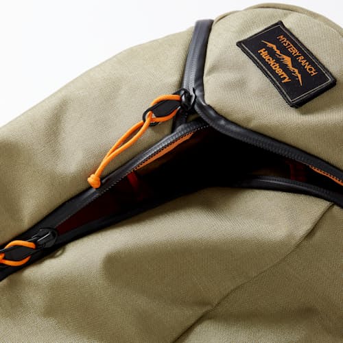 laydown image of Huckberry x Mystery Ranch Urban Assault 21L