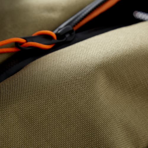 laydown image of Huckberry x Mystery Ranch Urban Assault 21L
