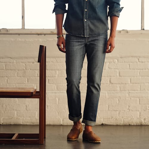 lifestyle image of Graham Relaxed Tapered Denim Jeans