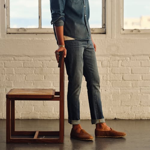 lifestyle image of Graham Relaxed Tapered Denim Jeans