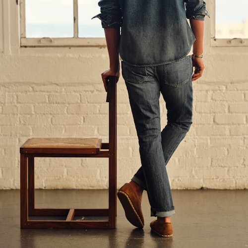 lifestyle image of Graham Relaxed Tapered Denim Jeans